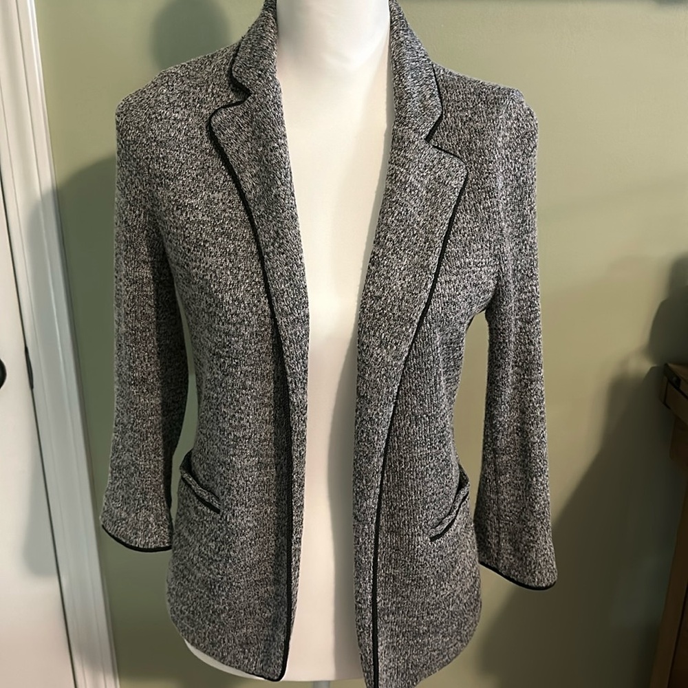 Skies are blue. Size small ladies blazer.